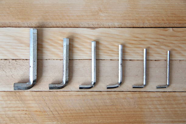 Set of hex keys on a wooden background